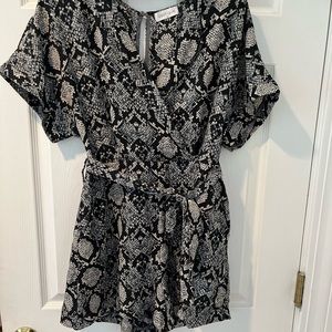 Vestique black snakeskin romper